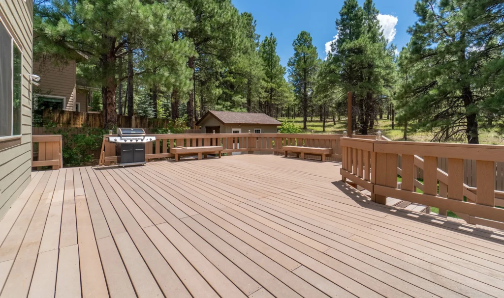 Choosing the Right Materials: A Winter Guide to Wood vs. Composite Decking for a Canadian Climate